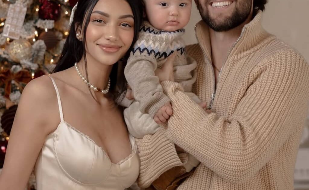 Ivor McCray with his wife and son